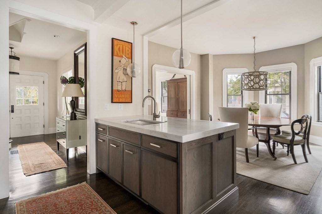 39 Meacham Road, Unit 39 Somerville, MA 02144 - Photo 13 of 40 a kitchen with sink cabinets and refrigerator