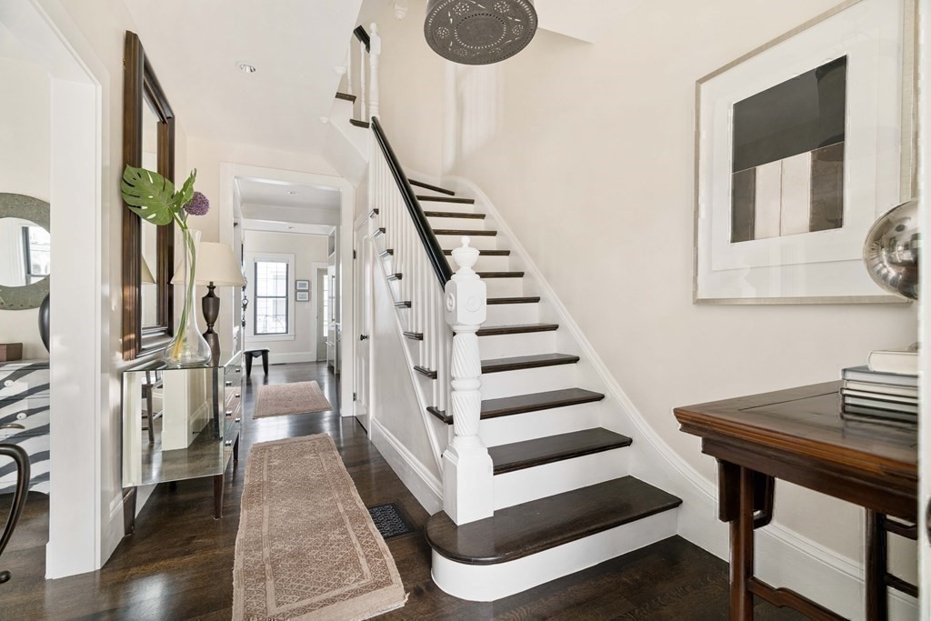 39 Meacham Road, Unit 39 Somerville, MA 02144 - Photo 17 of 40 a view of entryway and hall with wooden floor