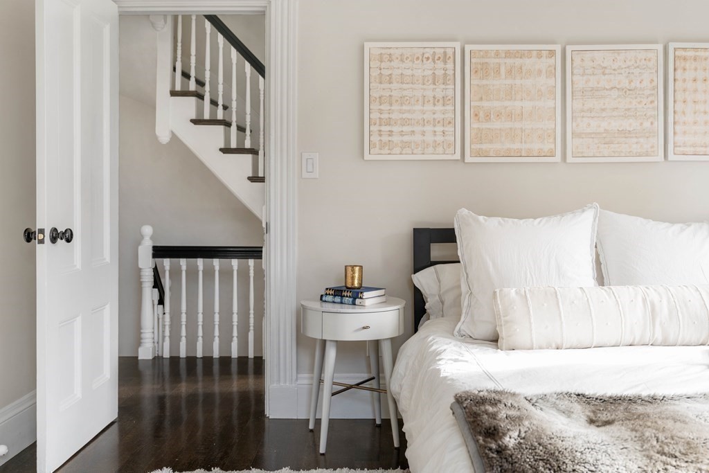 39 Meacham Road, Unit 39 Somerville, MA 02144 - Photo 18 of 40 a bedroom with a bed and a window