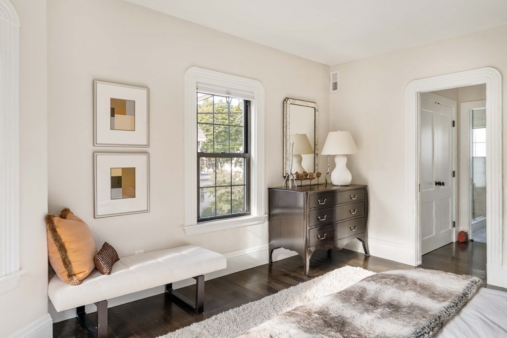 39 Meacham Road, Unit 39 Somerville, MA 02144 - Photo 21 of 40 a living room with furniture and a window