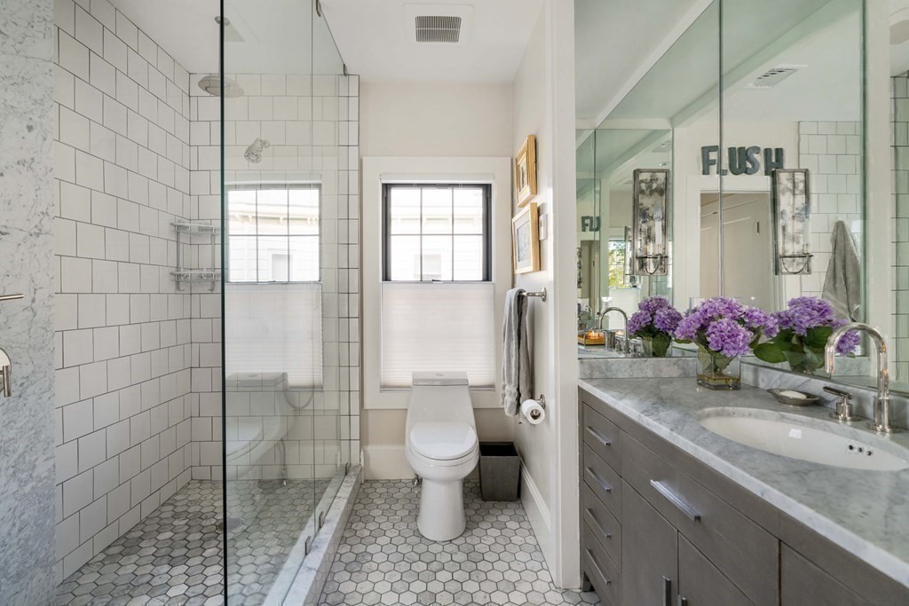39 Meacham Road, Unit 39 Somerville, MA 02144 - Photo 23 of 40 a bathroom with a sink toilet and shower