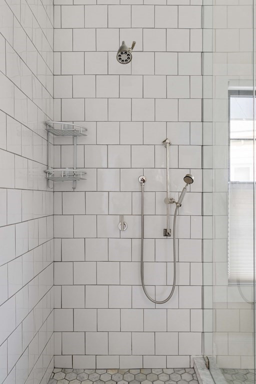 39 Meacham Road, Unit 39 Somerville, MA 02144 - Photo 24 of 40 a bathroom with a shower