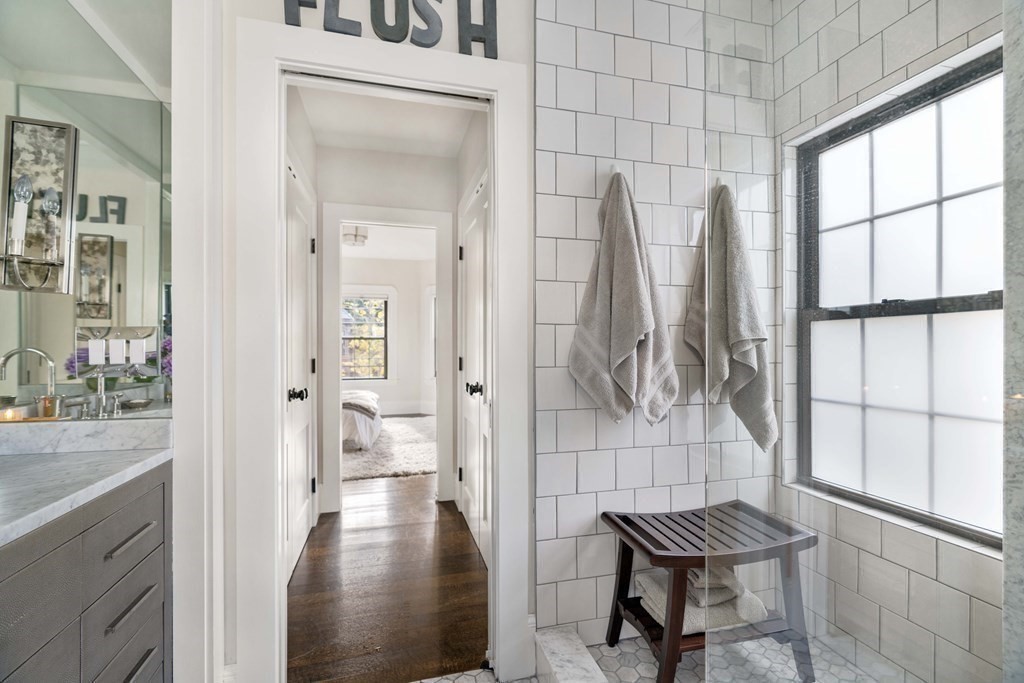 39 Meacham Road, Unit 39 Somerville, MA 02144 - Photo 25 of 40 a bathroom with a bathtub and a shower