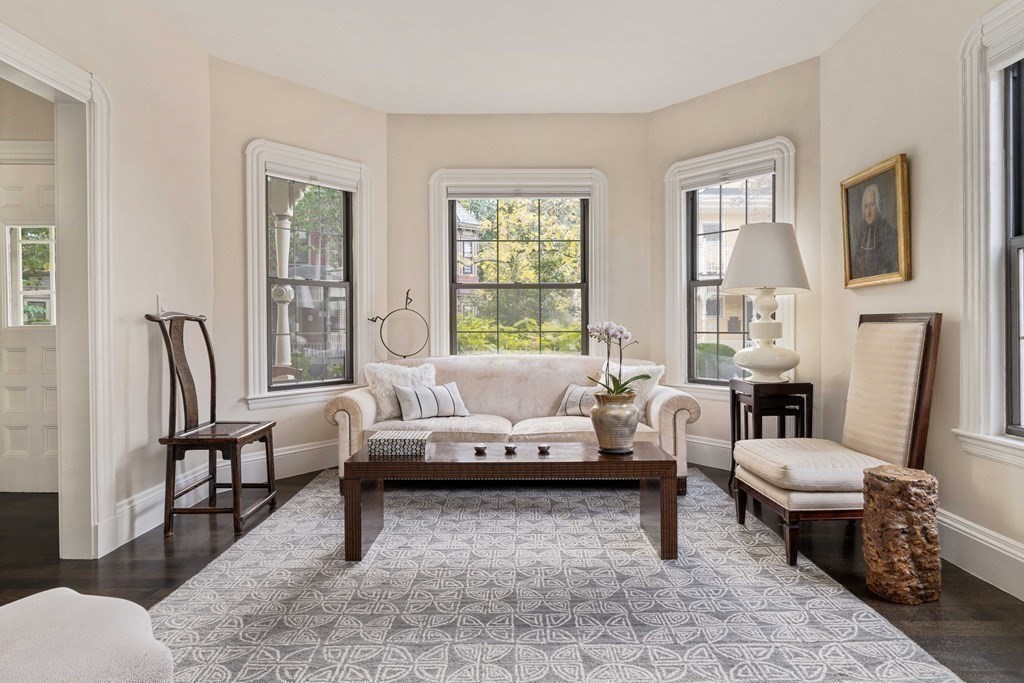 39 Meacham Road, Unit 39 Somerville, MA 02144 - Photo 3 of 40 a living room with furniture and a potted plant