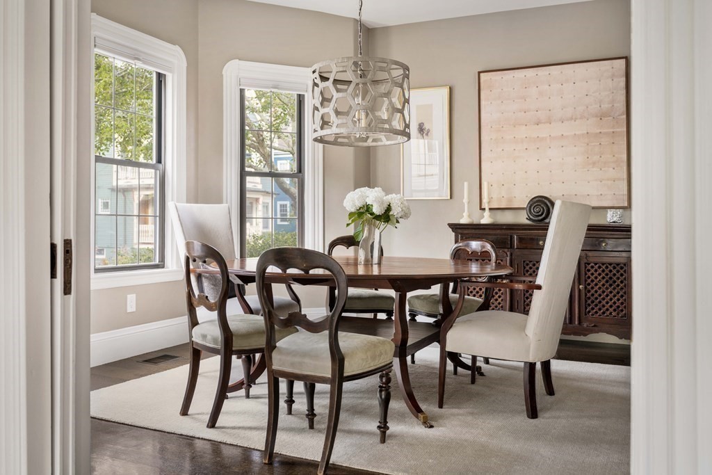 39 Meacham Road, Unit 39 Somerville, MA 02144 - Photo 7 of 40 a view of a dining room with furniture window and outside view