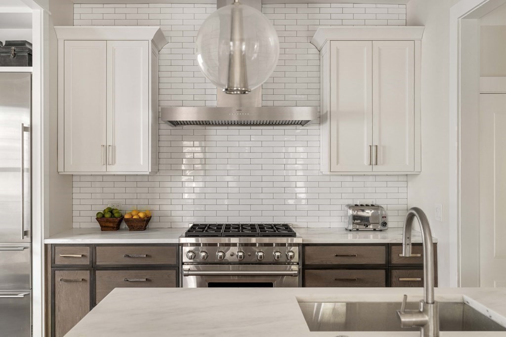 39 Meacham Road, Unit 39 Somerville, MA 02144 - Photo 10 of 40 a kitchen with cabinets and appliances