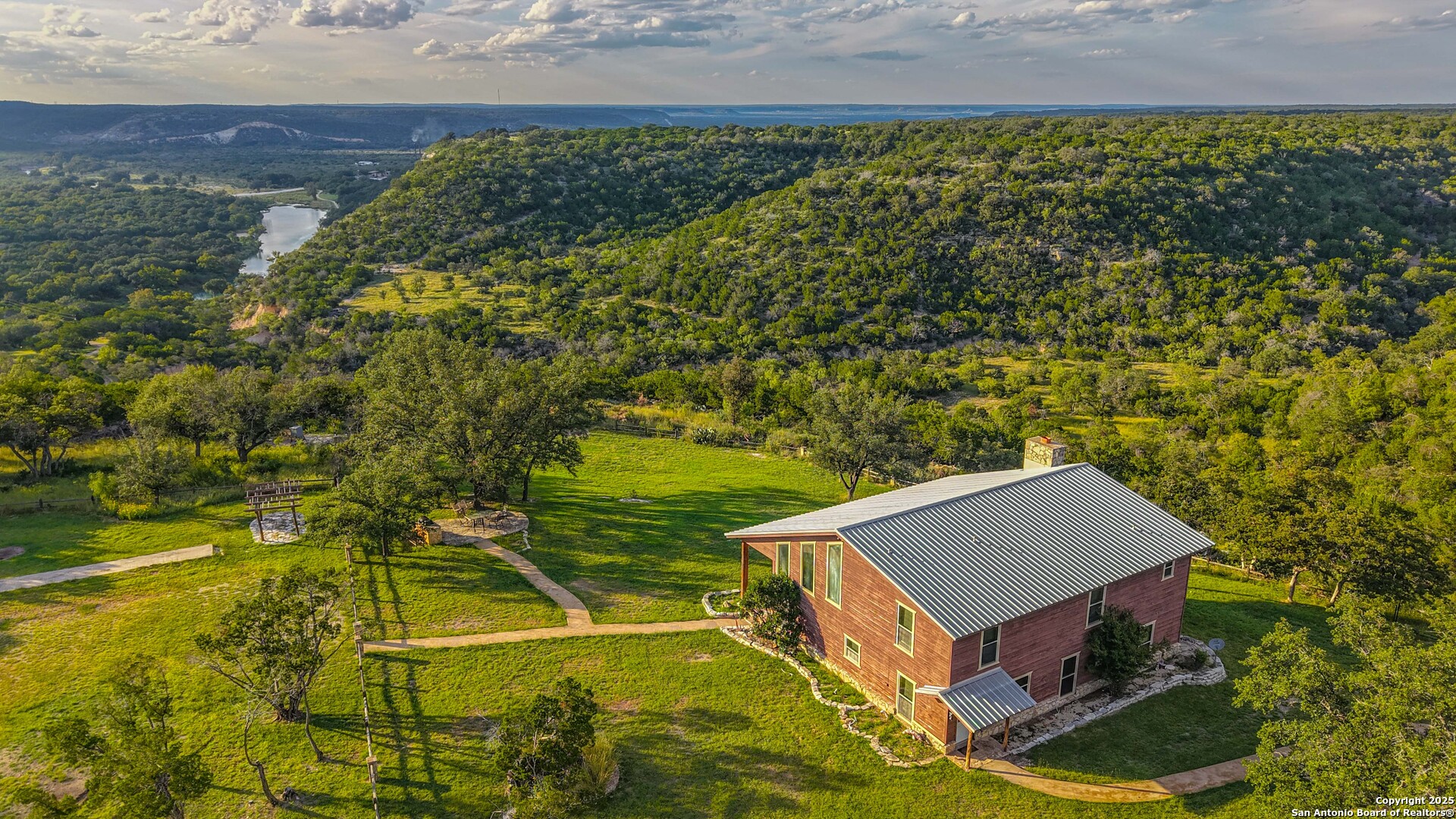 Tbd Fm 2169 Junction, TX 76849 - Photo 22 of 89 a view of a backyard with plants and large trees