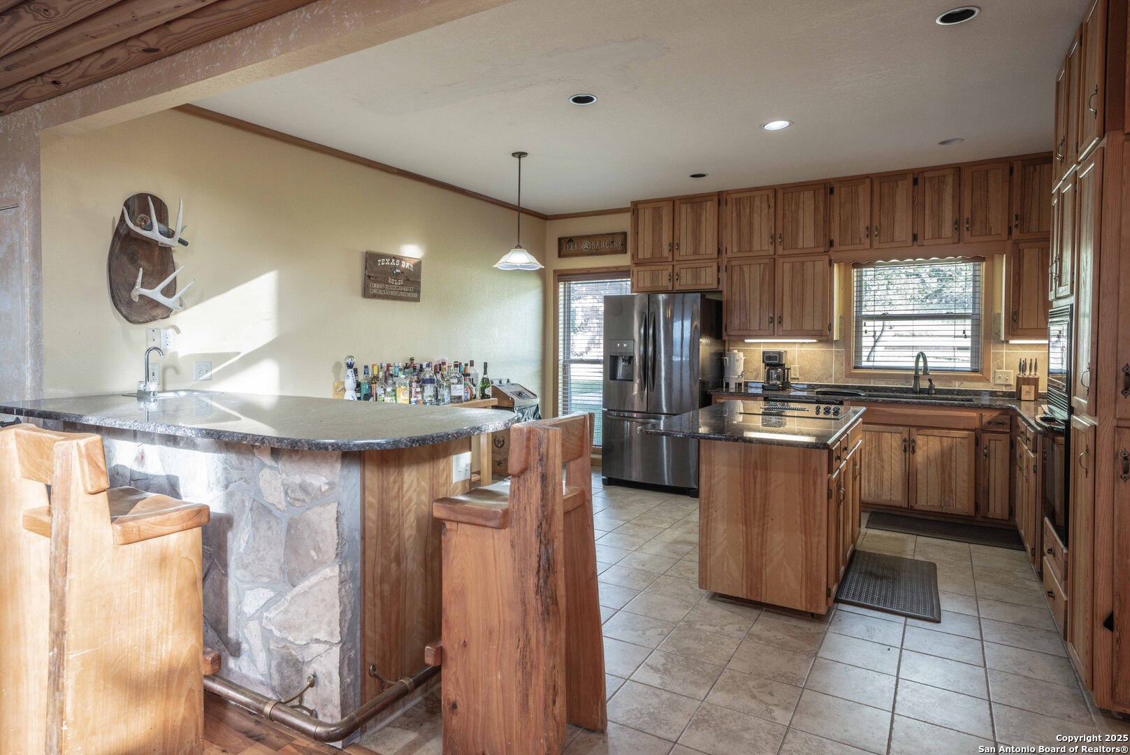 Tbd Fm 2169 Junction, TX 76849 - Photo 31 of 89 a kitchen with a refrigerator and a sink