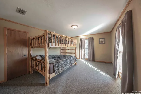 a view of a lake with a yard