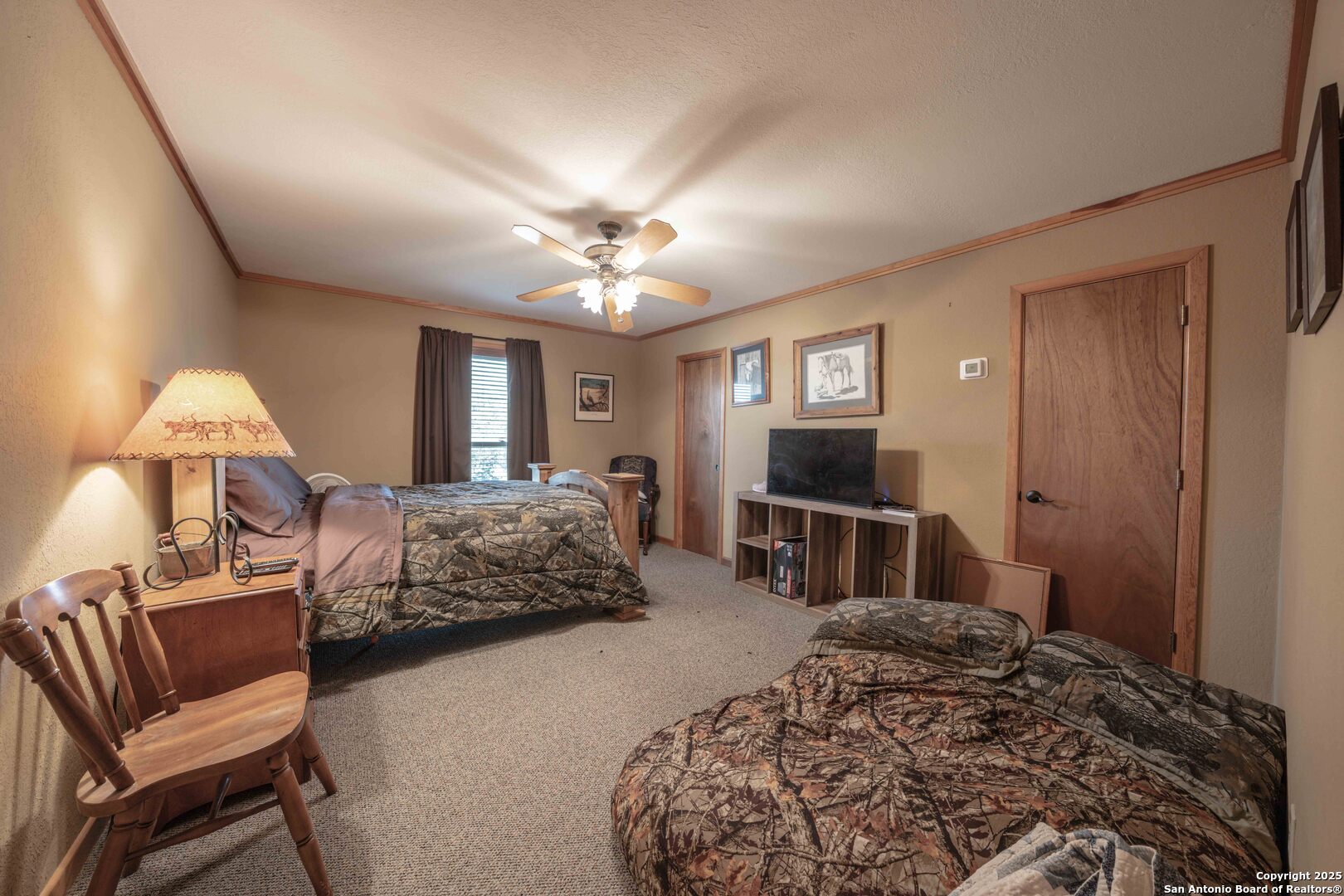 Tbd Fm 2169 Junction, TX 76849 - Photo 36 of 89 a bedroom with furniture and a flat screen tv