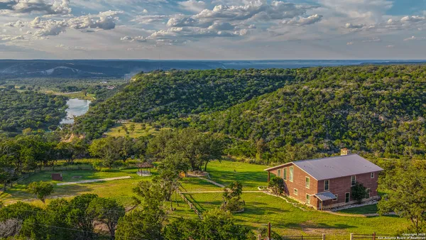 a lake view with a garden
