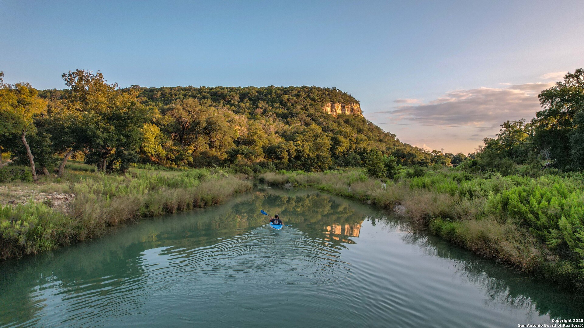 Tbd Fm 2169 Junction, TX 76849 - Photo 51 of 89 a view of a lake with a mountain in the background