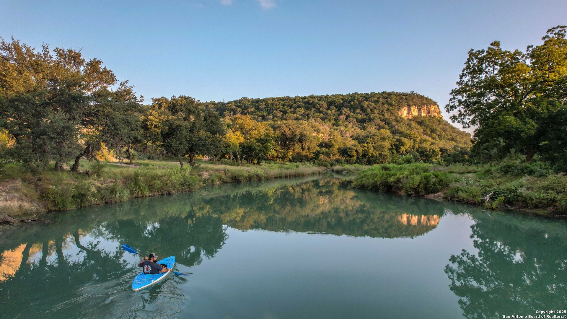 Tbd Fm 2169 Junction, TX 76849 - Photo 52 of 89 a view of a lake with a mountain in the background