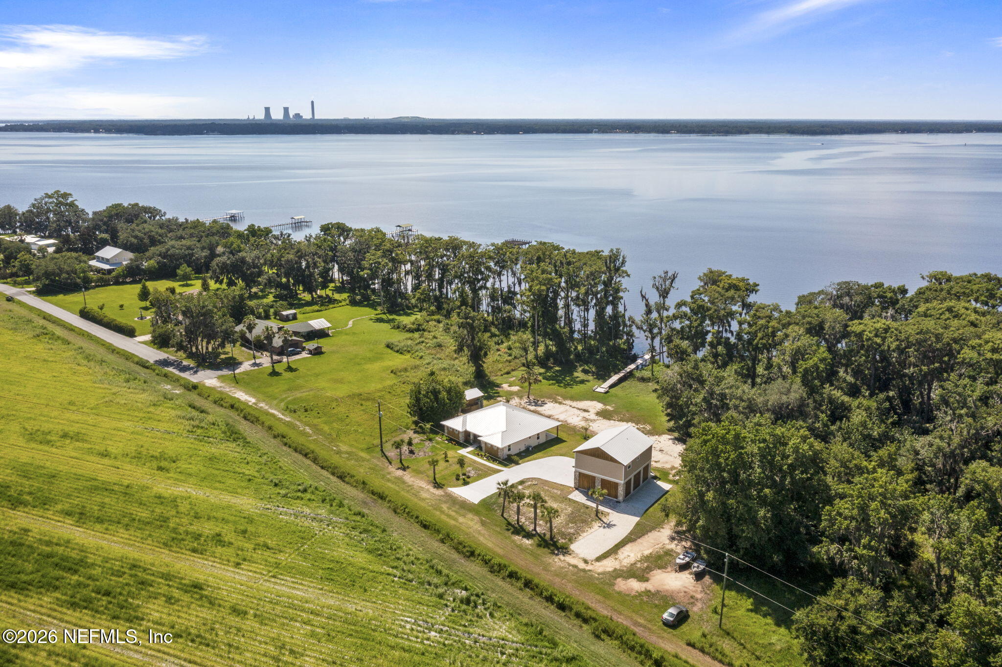 159 Mays Cove Road East Palatka, FL 32131 - Photo 59 of 62 a view of a lake with a mountain