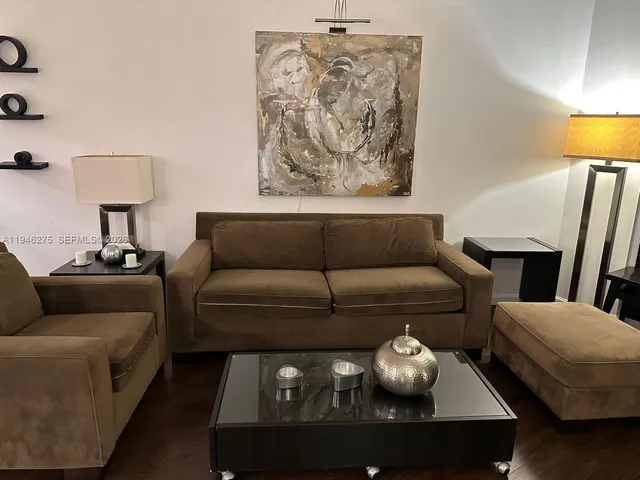 a living room with furniture and a couch