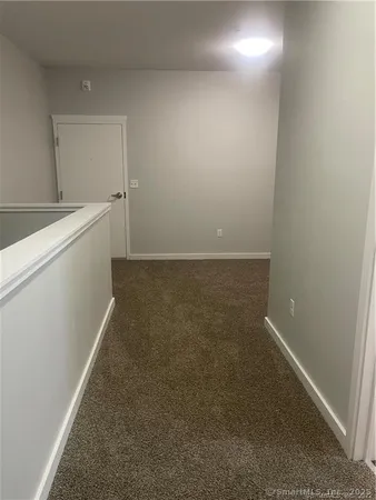 a view of a room with an empty space