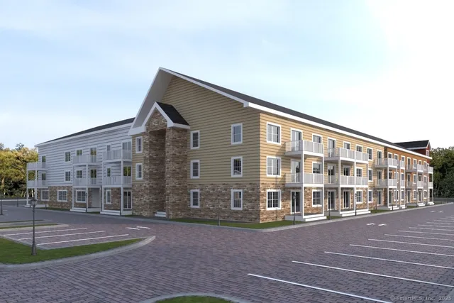 a view of a building with a street