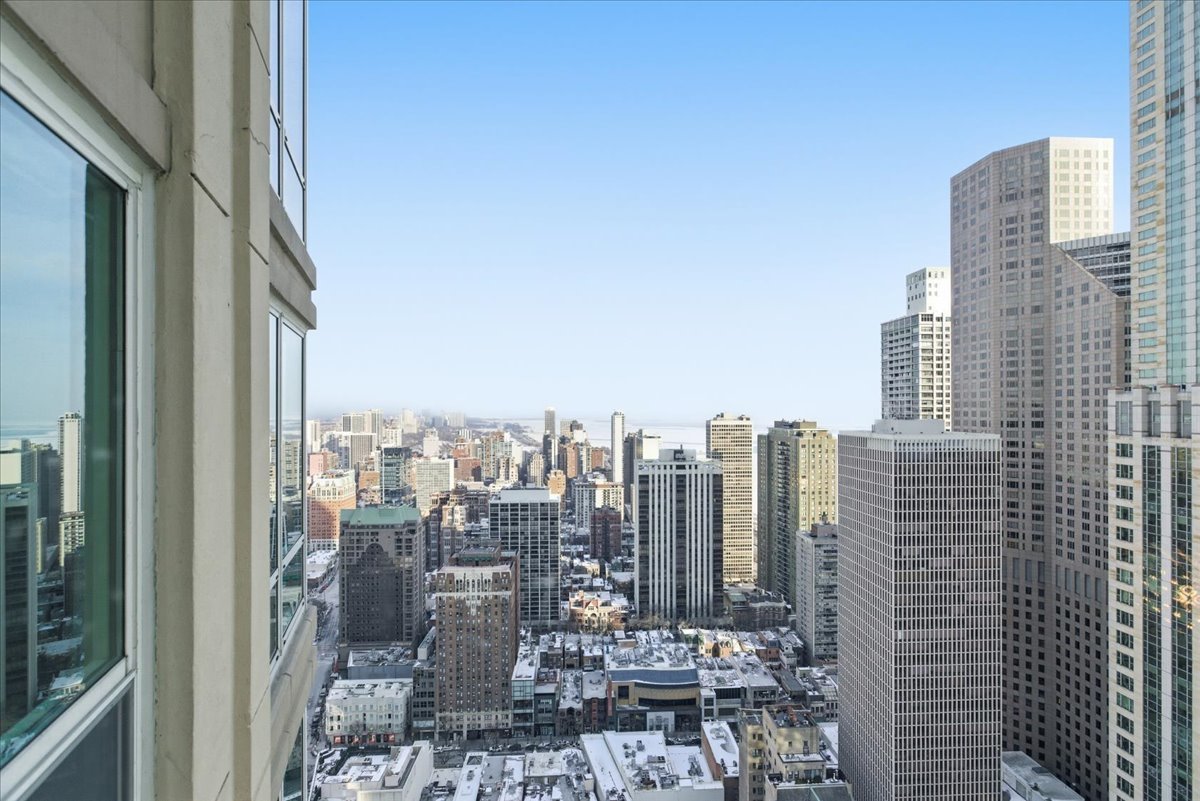 57 East Delaware Place, Unit 3904 Chicago, IL 60611 - Photo 15 of 21 a view of a city with tall buildings