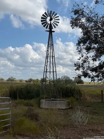 a view of a yard with a fountain