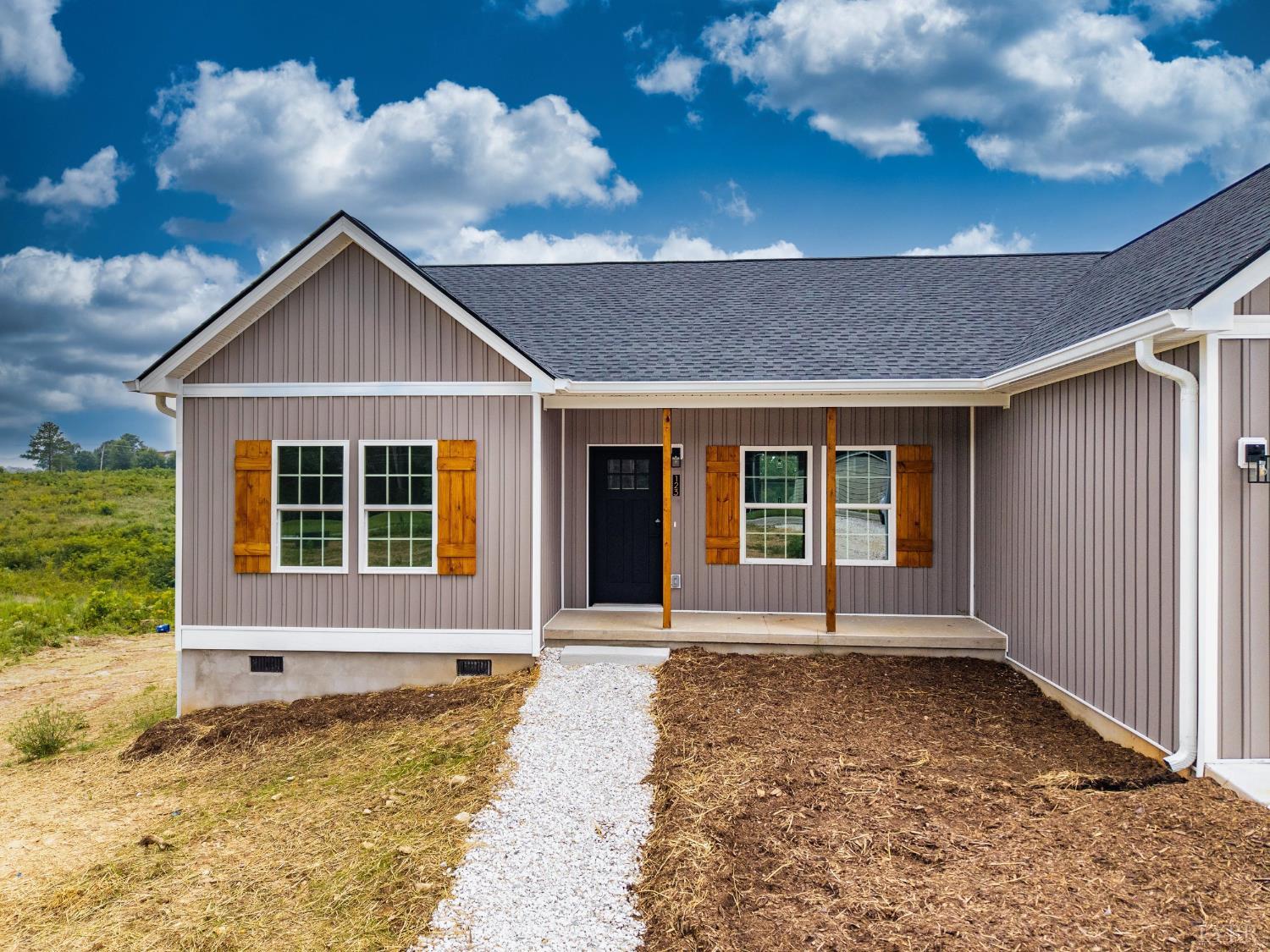 123 Fox Hall Drive Amherst, VA 24521 - Photo 3 of 40 a front view of a house with a yard