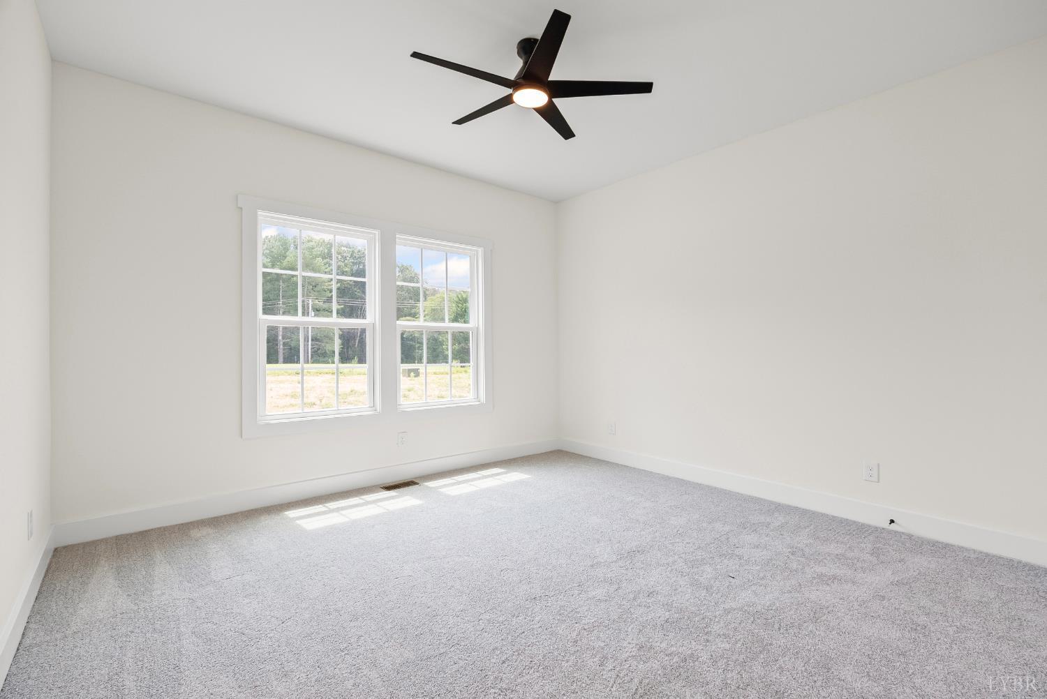 123 Fox Hall Drive Amherst, VA 24521 - Photo 31 of 40 an empty room with a window and a fan