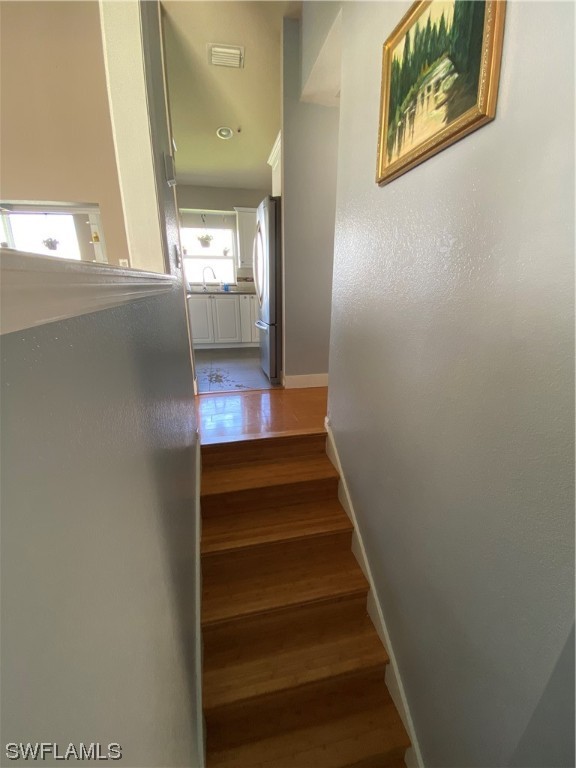 17146 Oriole Road Fort Myers, FL 33967 - Photo 16 of 38 a view of entryway and hall with wooden floor