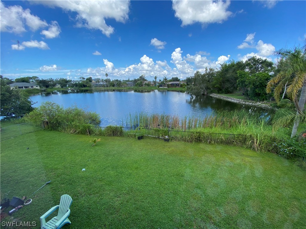 17146 Oriole Road Fort Myers, FL 33967 - Photo 2 of 38 a view of a lake from a yard
