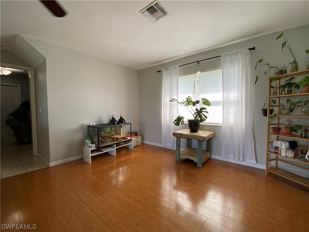17146 Oriole Road Fort Myers, FL 33967 - Photo 7 of 38 a living room with furniture and a table