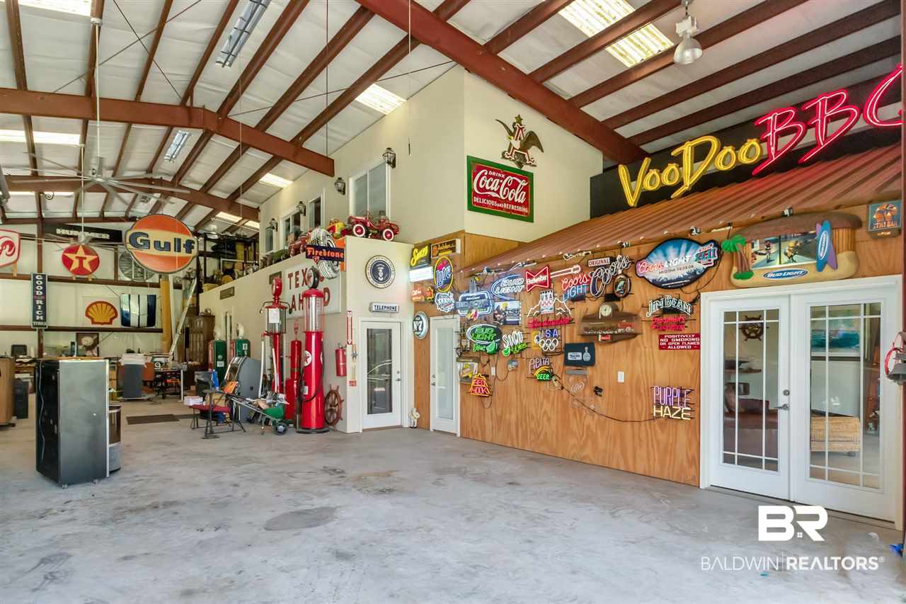 11000 Kelly Road Mobile, AL 36608 - Photo 18 of 48 Check out the metal beams and two large fans!