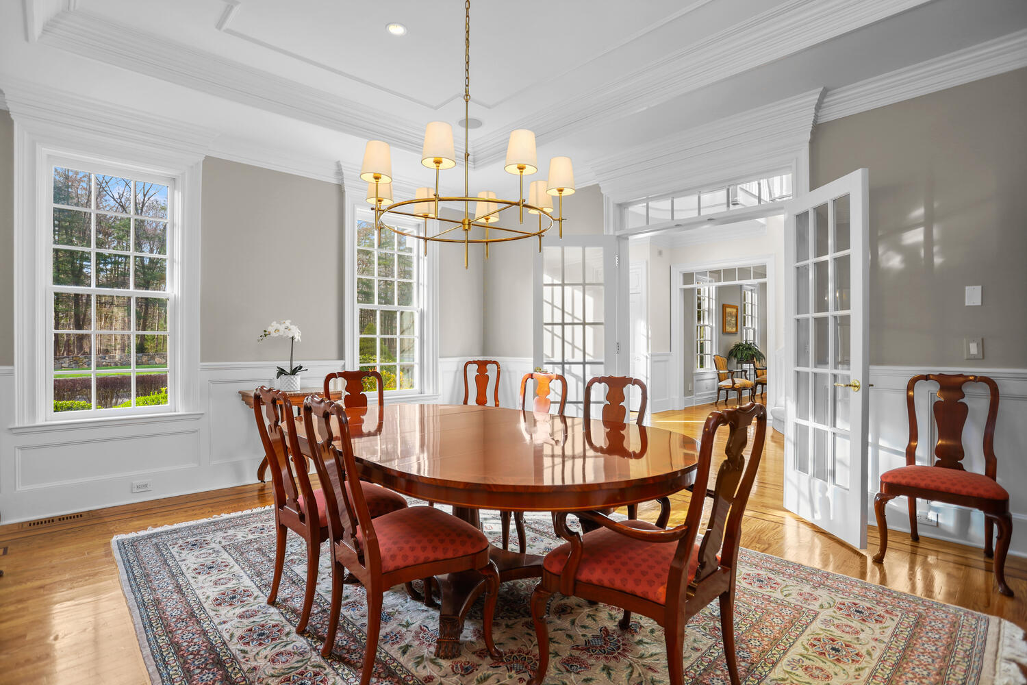 31 Ramhorne Road New Canaan, CT 06840 - Photo 14 of 56 a view of a dining room with furniture window and wooden floor