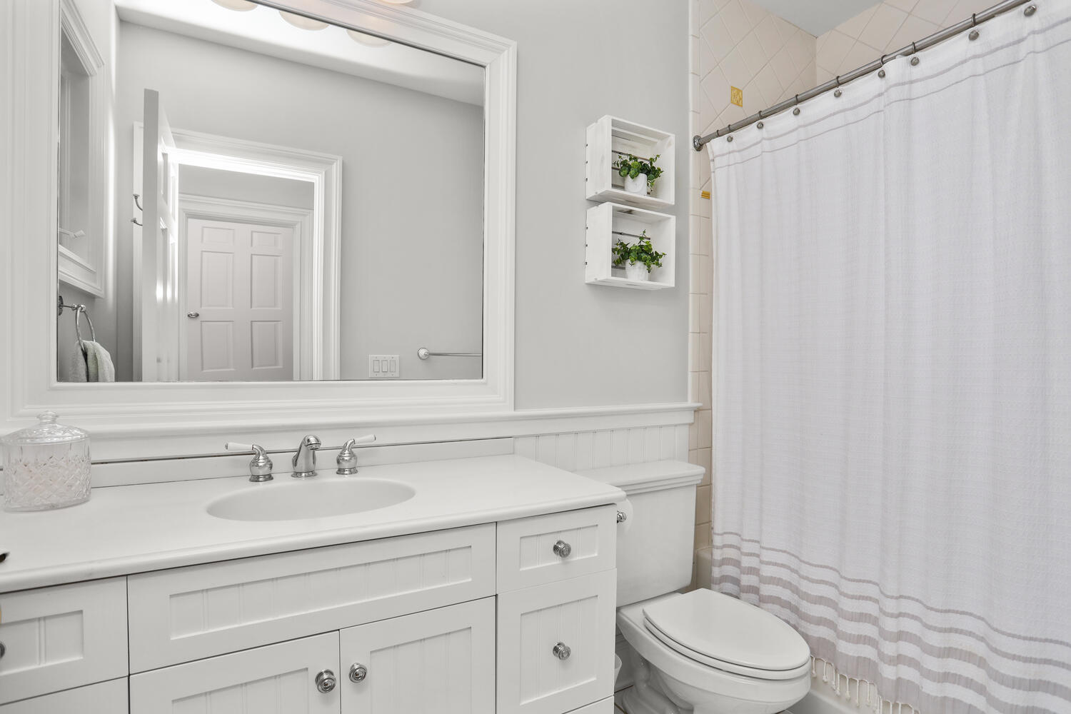 31 Ramhorne Road New Canaan, CT 06840 - Photo 33 of 56 a bathroom with a sink a toilet a mirror a vanity and shower