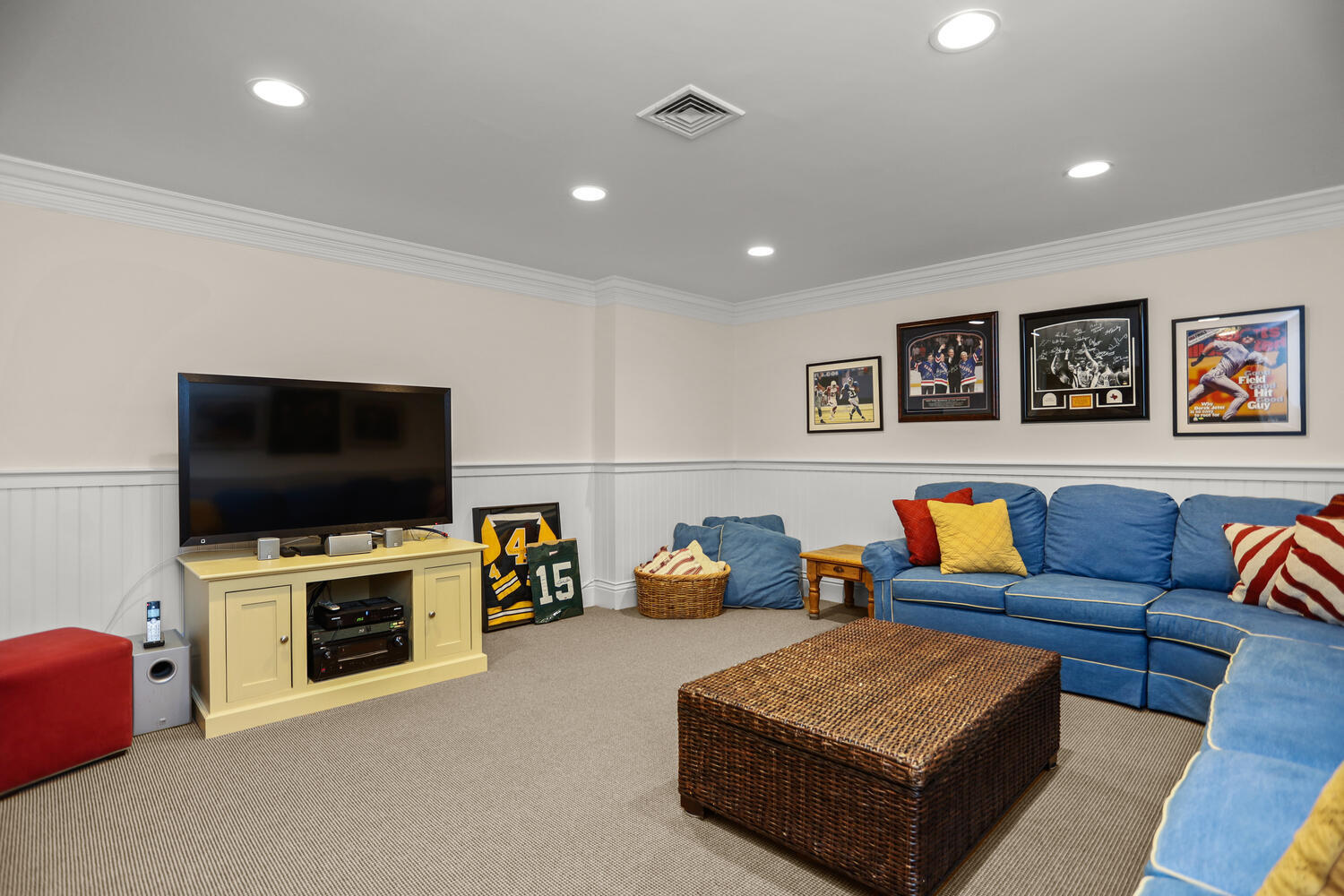 31 Ramhorne Road New Canaan, CT 06840 - Photo 40 of 56 a living room with furniture and a flat screen tv