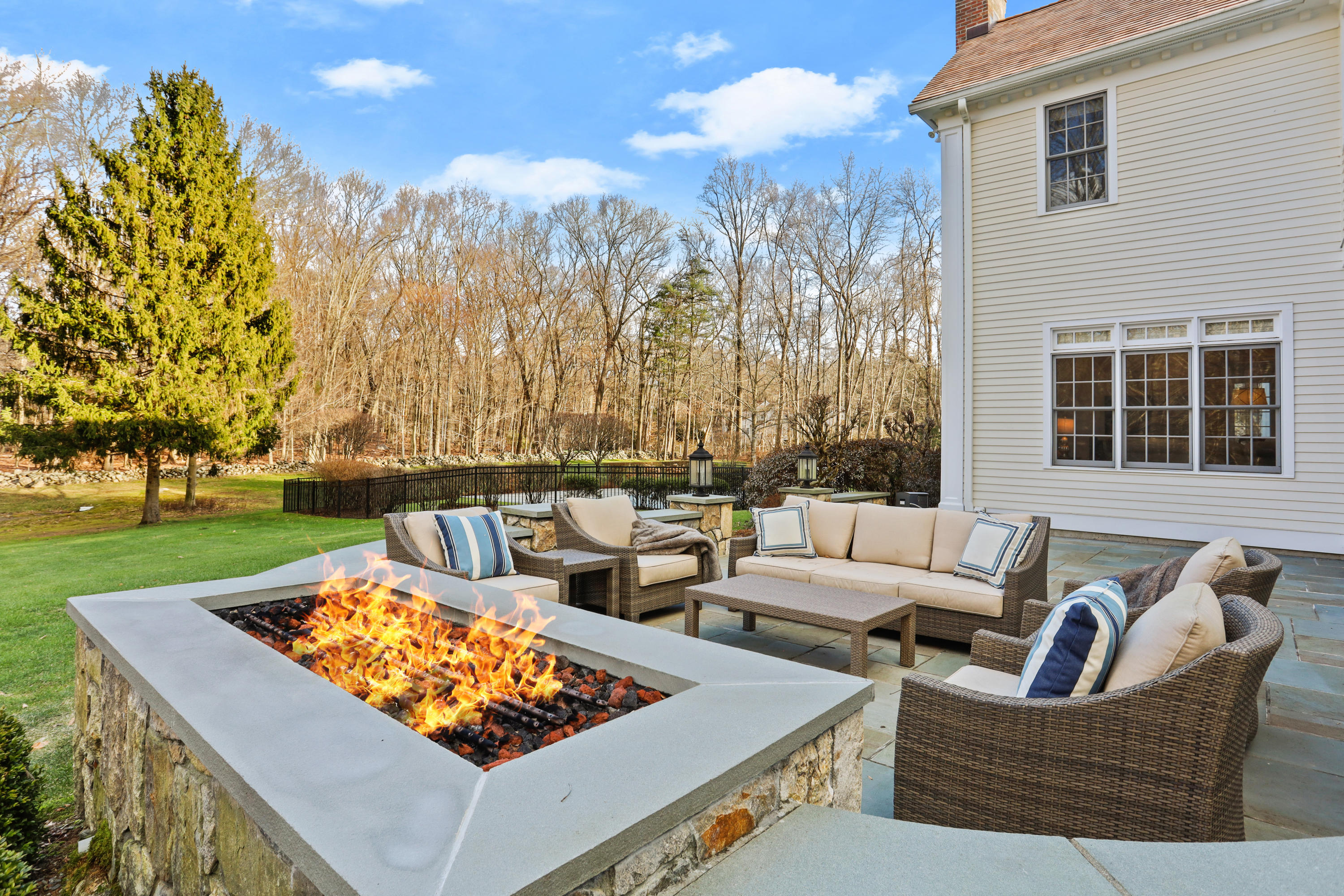 31 Ramhorne Road New Canaan, CT 06840 - Photo 45 of 56 a outdoor living space with furniture and a garden