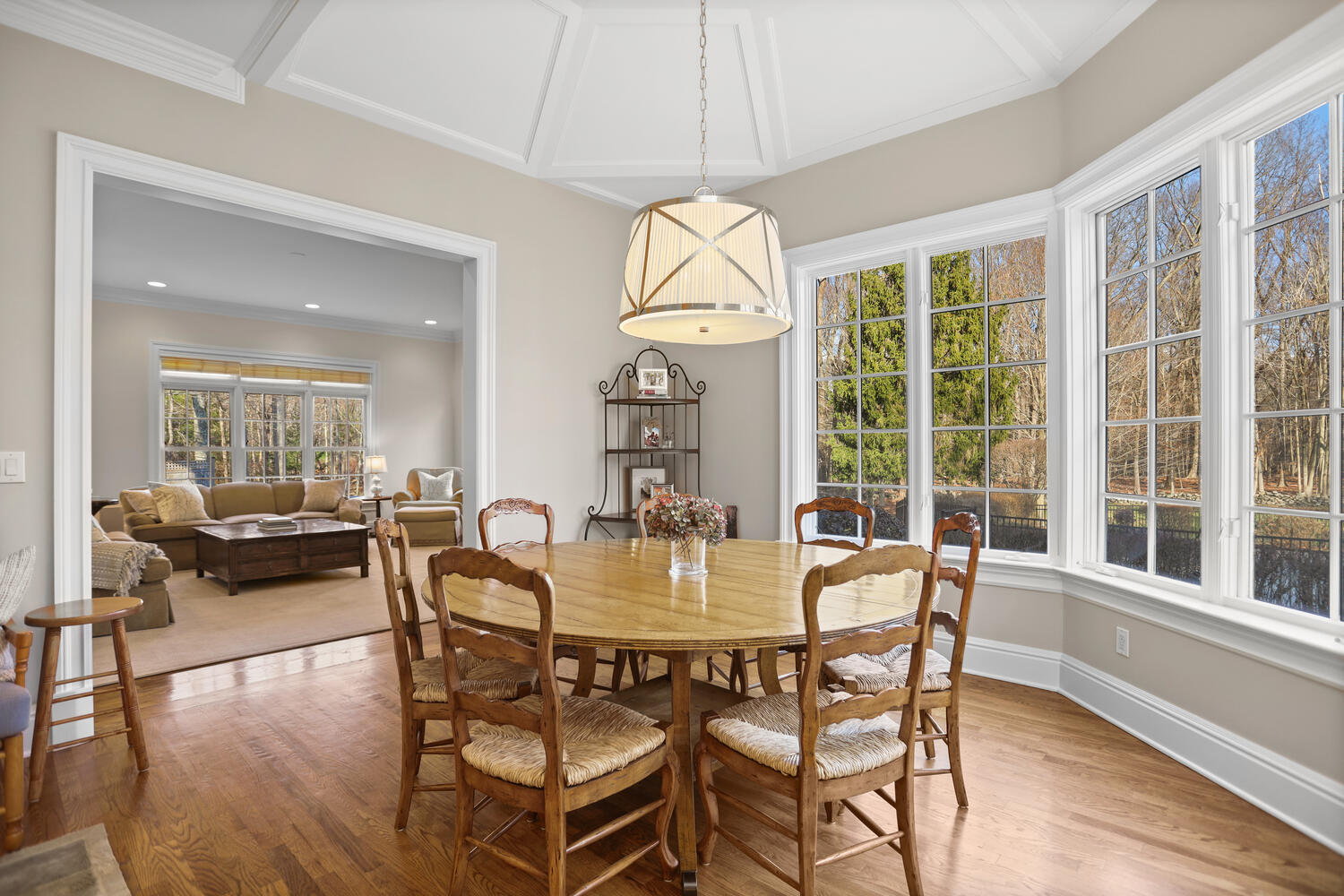 31 Ramhorne Road New Canaan, CT 06840 - Photo 9 of 56 a dining room with furniture a chandelier and wooden floor