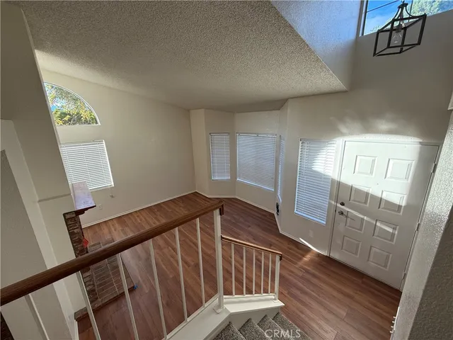 a view of an entryway with a hardwood