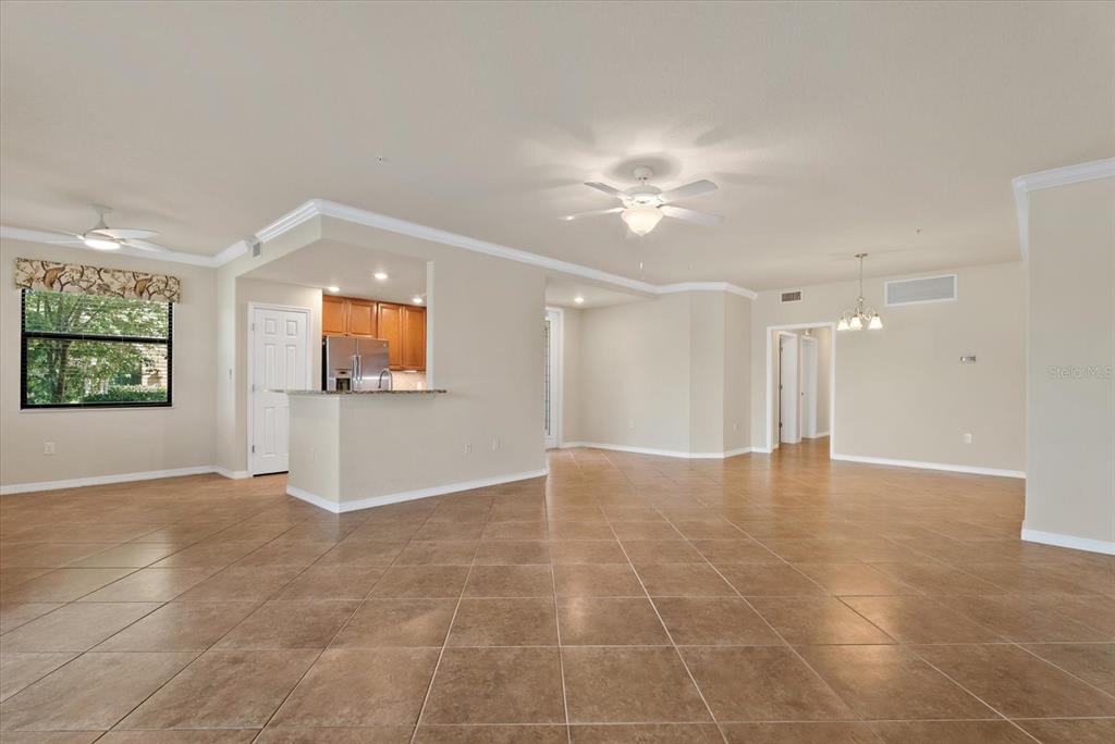20080 Ragazza Circle, Unit 102 Venice, FL 34293 - Photo 16 of 49 a view of an empty room with a window