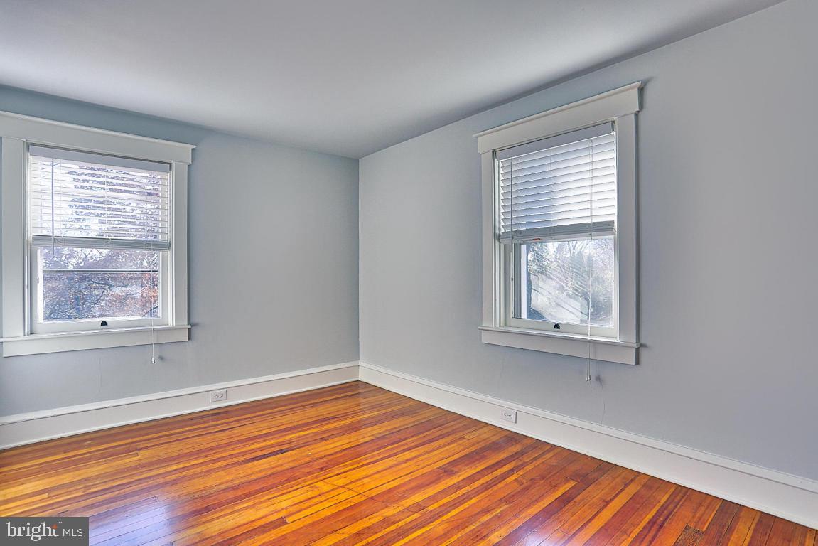 181 Windover Turn Lancaster, PA 17601 - Photo 18 of 58 a view of empty room with wooden floor and fan