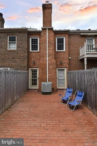 a backyard of a house with seating space