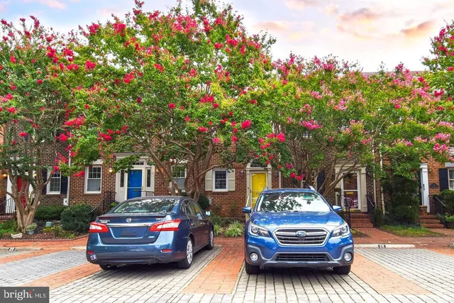 a car parked in front of a house