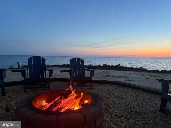 1 LaVallette Road Crisfield, MD 21817 - Photo 36 of 43 Cozy fire by the tranquil shore.