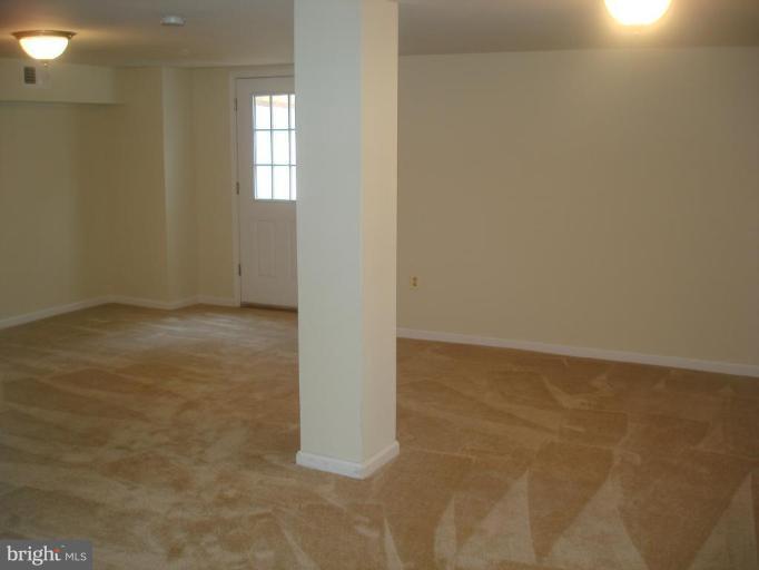 9171 Fort Smallwood Road Pasadena, MD 21122 - Photo 22 of 25 Finished Lower Level