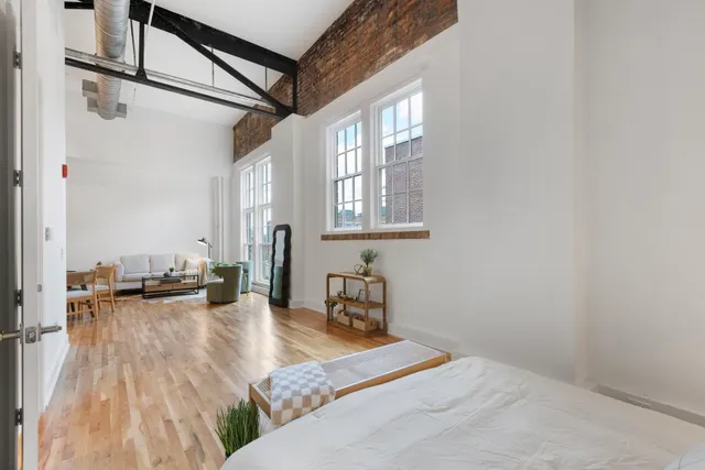 a en suite bathroom with a sink and a mirror