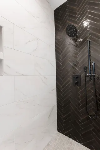 a view of a hallway with washer and dryer