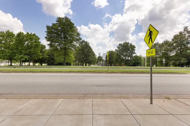a view of a city street from a building