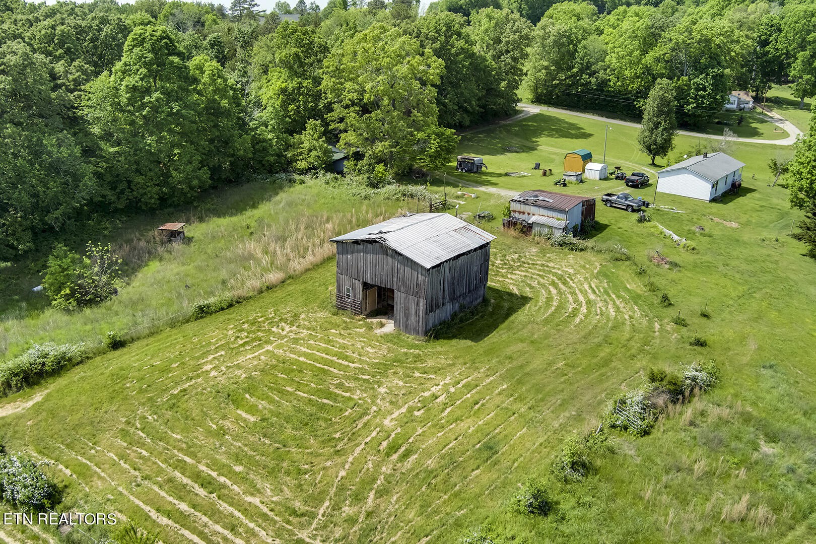 0 Robinson Road Loudon, TN 37774 - Photo 3 of 26 a backyard of a house with a yard and outdoor seating