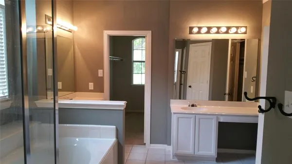 a bathroom with a sink a toilet and a bathtub