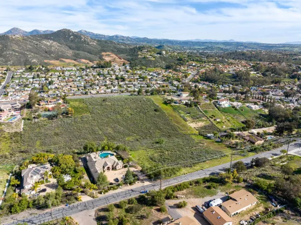 an aerial view of residential house with outdoor space