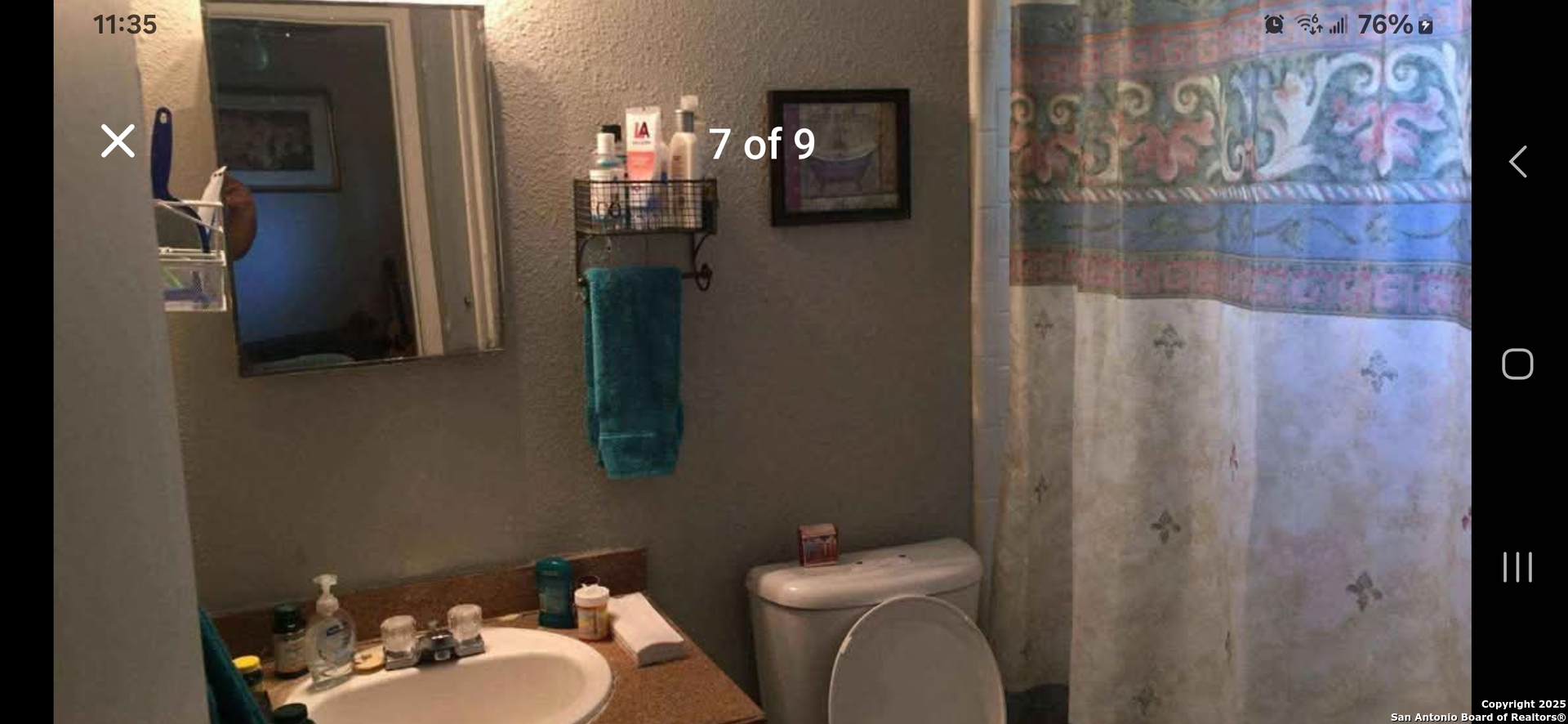 1455 Hillcrest Drive, Unit 8UPSTAIRS San Antonio, TX 78228 - Photo 7 of 9 a bathroom with a sink vanity mirror and toilet