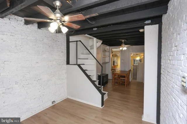 a view of entryway with wooden floor