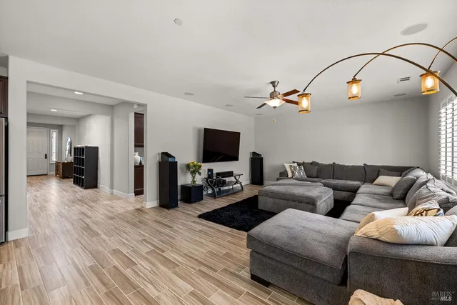 a work room with furniture and windows